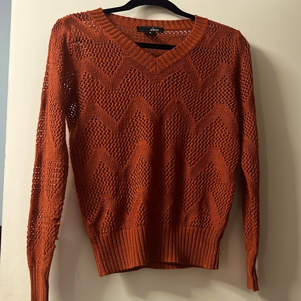 Long sleeved open lace sweater